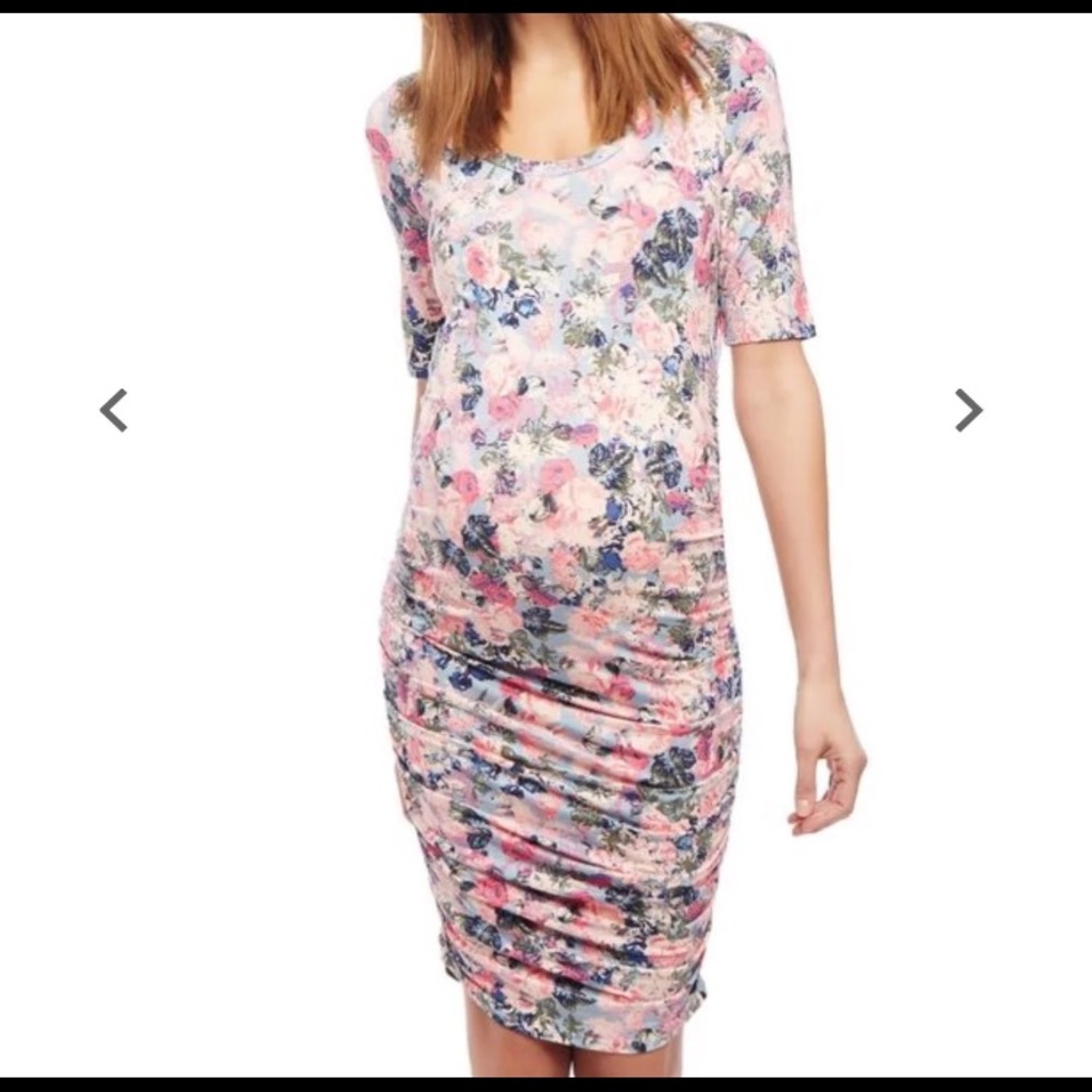 Small maternity dress. Stretchy sides for stomach.